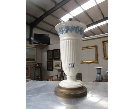 A Victorian Wedgwood style vase converted to a table lamp.