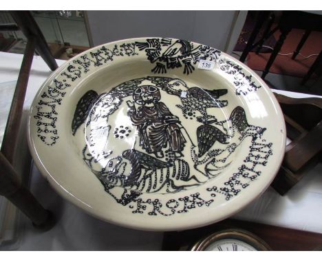 A large ceramic charger.