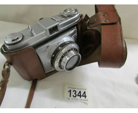 A cased Kodak 'Retinette' camera.