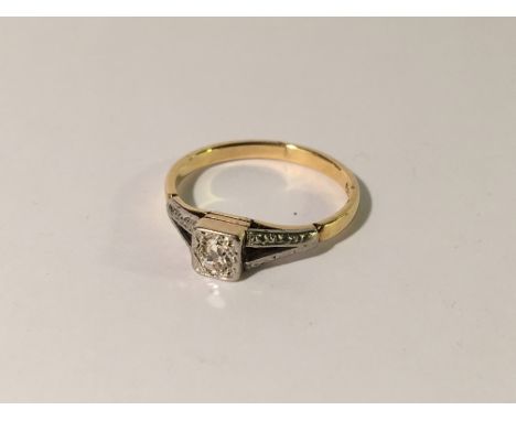 An art deco old cut diamond single stone ring, platinum set and 18ct gold stamped, size K.