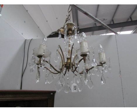 A 6 lamp chandelier.