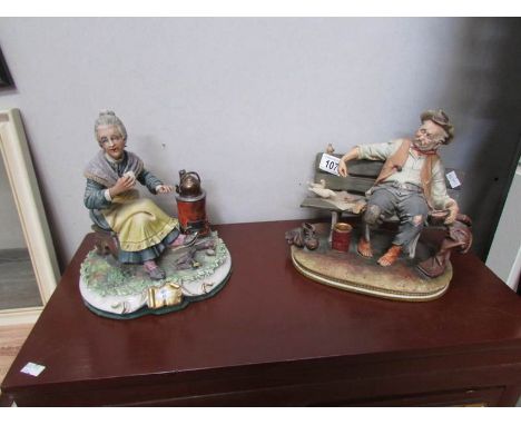 2 Capo di Monte figures being tramp on bench feeding birds and woman by stove.
