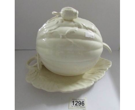 A Royal Cream ware pumpkin shaped soup tureen with ladle.
