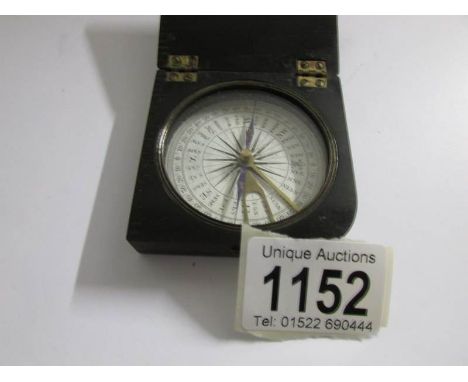 An early 20th century bakelite cased compass by Kemp & Co., Edinburgh.