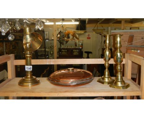 A pair of Victorian 'Diamond' candlestick, a brass ship's candle lamp and a copper bed warmer.