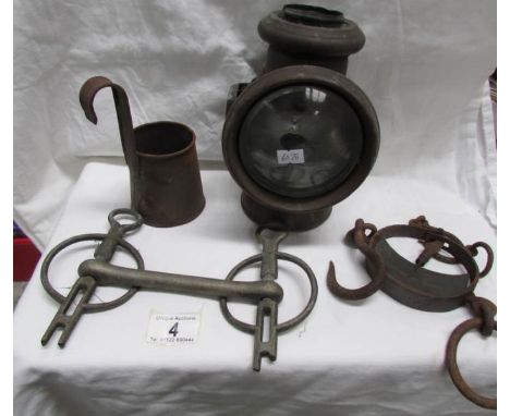 An old car lamp a/f, a beer measure, an unusual set of scales and a horse bit.