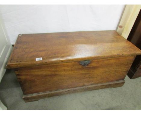 A rare sea captain's trunk with tapered sides, rope handles and alarm bell in lock.