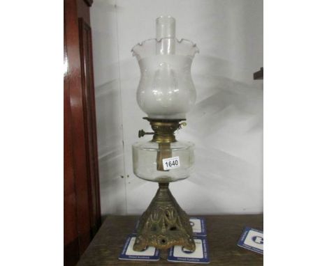 A Victorian oil lamp.