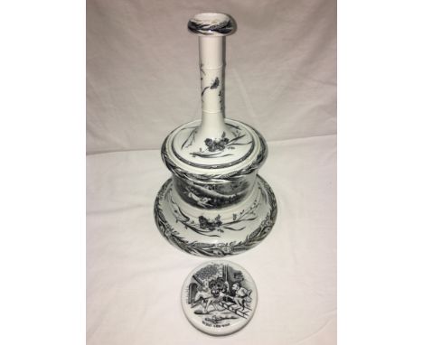 An unusual 19th century 4 piece blue and white candlestick (knob a/f).