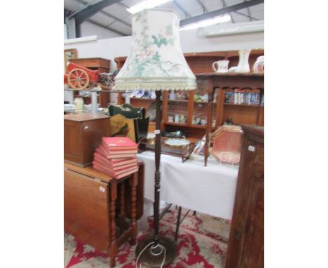 A standard lamp with shade.