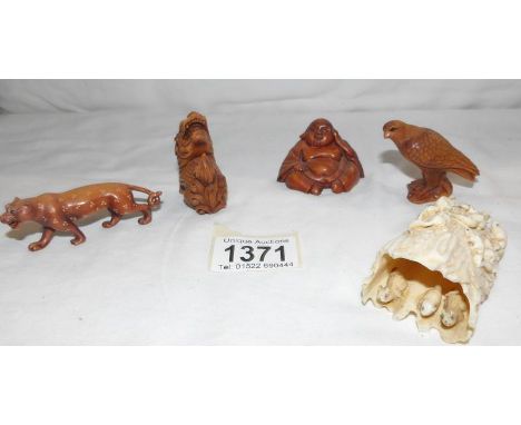 4 netsuke and one other item.
