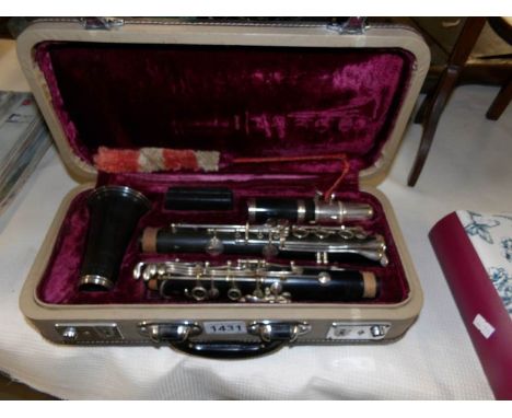 A cased Consol clarinet.