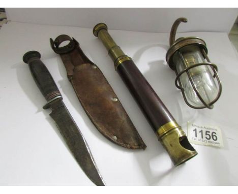 An old telescope a/f, a hunting knife in sheath and a ship's lamp, maker L B Solomons, London.