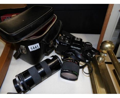 A Rolleiflex SL 35mm camera and 2 lenses (1:2.8-3.5 f = 35-80mm and 1:45 f + 85-210mm)