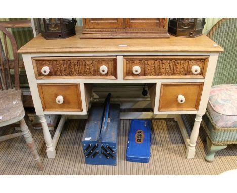 A part painted light oak knee hole desk with four drawers