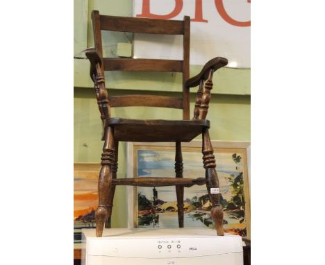 An Oxford style slat back armchair of typical form &amp; construction with a three-piece ladder back