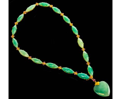 A gold, ruby and jadeite necklace by Buccellati, signed Buccllati Italy, length 41.5cm.