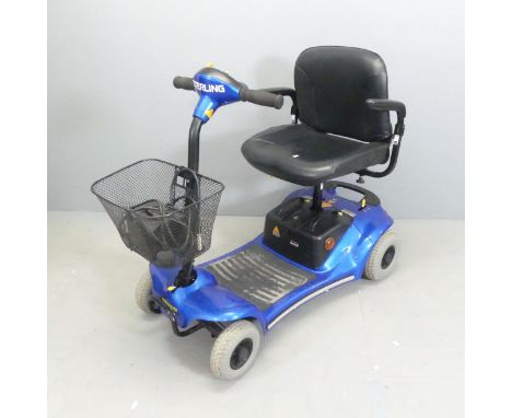 A Sterling Pearl mobility scooter, with charging cable. GWO. 