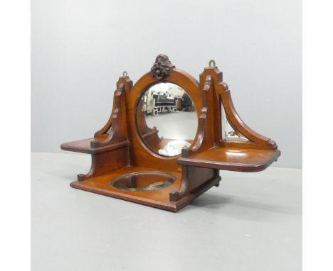 An Art Nouveau mirrored hanging shelf. 57x35x20cm. 