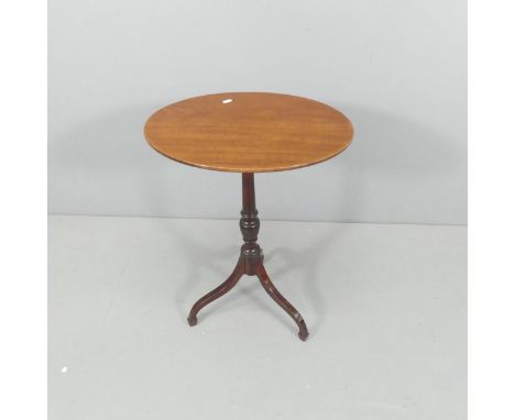 A 19th century mahogany oval top wine table in tripod base. 50x70x38cm. 