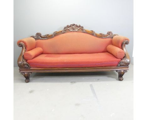 A Victorian mahogany and upholstered sofa, with carved acanthus leaf and lion paw decoration. Overall 205x104x85cm, seat 150x