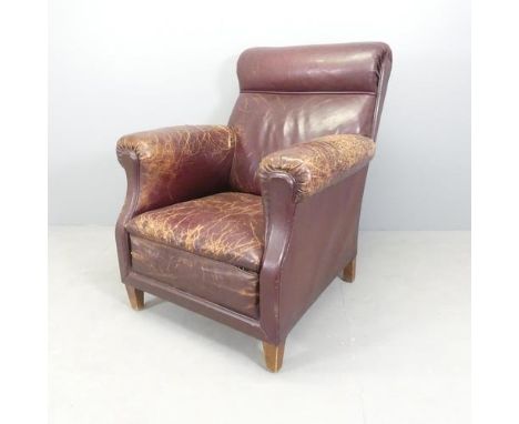 A vintage French leather upholstered club armchair. Overall 84x102x95cm, seat 52x42x50cm 