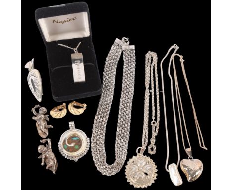 A pair of Christian Dior clip-on earrings, various silver pendants and chains, a silver posy holder lapel brooch, pair of Kei