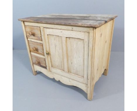 A vintage pine sideboard with three drawers and single cupboard door. 96x79x57cm.Appears to have been stored somewhere damp. 