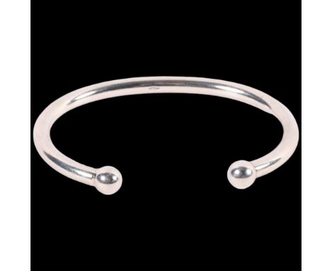 A sterling silver cuff bangle, boxed 