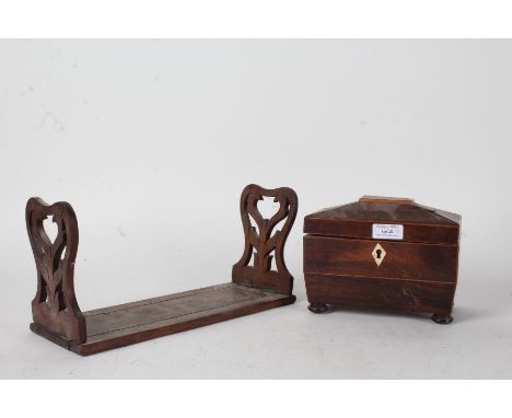 19th century rosewood and boxwood tea caddy, the hinged lid enclosing two compartments and raised on four bun feet, 18cm wide