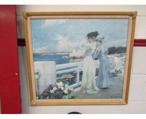 A print taken from an impressionist painting of two Edwardian ladies by a bridge at a waters front, 62cm x 70cm, framed and g