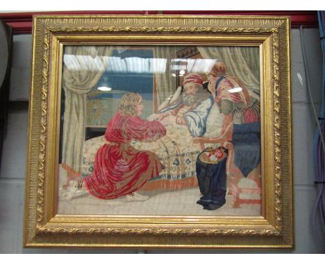 A gilt framed and glazed tapestry depicting a man in bed and two attendees, 47cm x 54cm