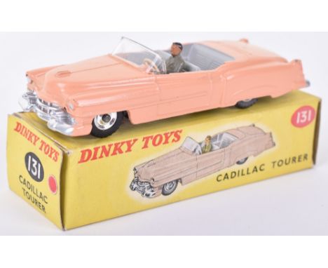 Dinky 131 Cadillac Eldorado Tourer with spun hubs, pink body, light grey interior, grey driver, spun hubs and treaded tyres, 