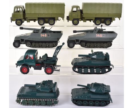 Two Dinky Toys 694 Hanomag Tank Destroyers, 2 x 668 Foden Army Trucks, in very good to excellent unboxed condition, plus a re