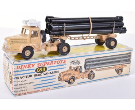 French Dinky Toys 893 Unic Sahara Tractor with Pipe carrier semi trailer, beige cab/chassis, white roof, beige wheel hubs, co