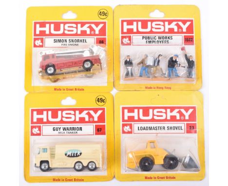 Four Carded Husky Models, 23 Loadmaster Shovel, yellow body, black plastic wheels,67 Guy Warrior Milk Tanker, cream , square 