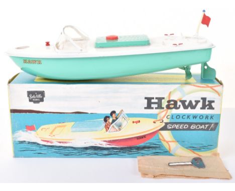 Sutcliffe Model Hawk Clockwork All Metal Speedboat, circa 1968, light green hull, white deck, light green hatch, Hawk decal t
