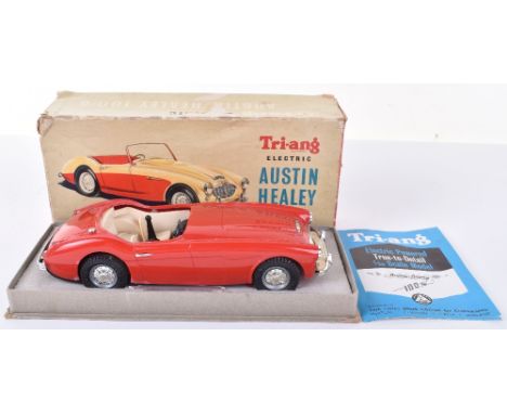 Boxed Tri-ang Austin Healey 100/6 battery operated 1/20 scale red plastic model, cream seats, original windscreen has been re