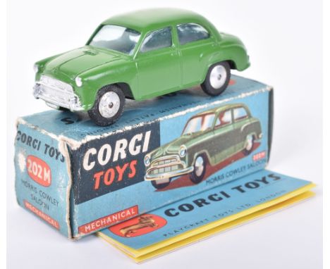 Corgi Toys 202M Morris Cowley Saloon, green body, flat spun wheels, in near mint original condition, with working mechanical 