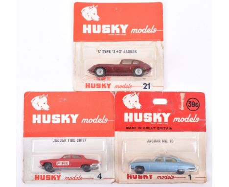 Three Carded Jaguar Husky Models, 1 Jaguar MK.10, yellow interior, light metallic blue,  grey plastic wheels, USA issue 39c p
