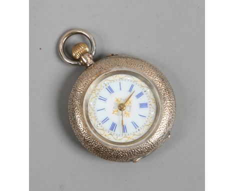 A 14ct gold fob watch with white enamel dial coloured Roman numeral and black enamel work to the back.