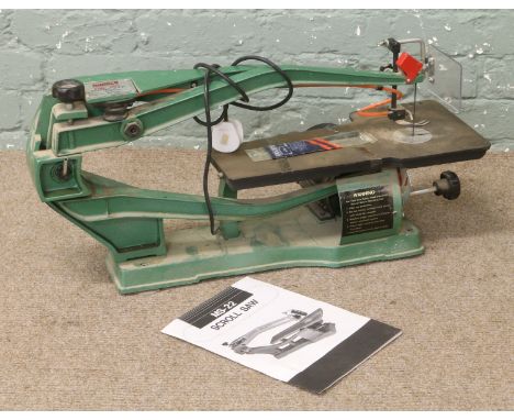 A Multico Pro-Mex 522 230 volt scroll jigsaw complete with manual and spare blades.