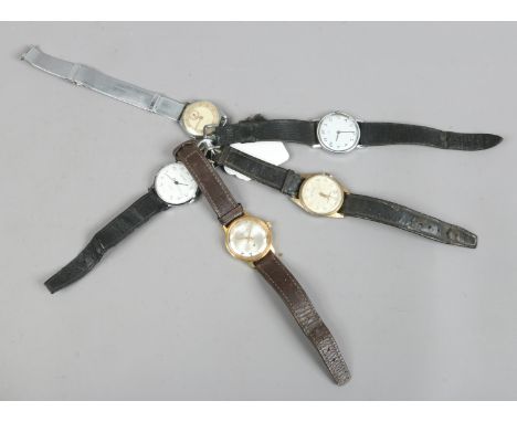 A collection of five gentlemans wristwatches to include manual wind examples.