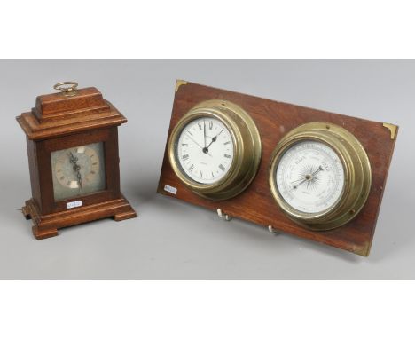 A mounted brass bulkhead quartz clock and barometer along with a mahogany cased quartz bracket clock.