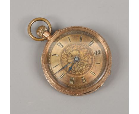 A 14ct gold cased fob watch. With engraved case and gilt dial having black enamel Roman numeral markers.