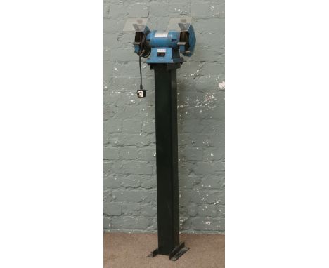A Wolf 230 volt 150mm bench grinder fitted with wire brush mounted on square profile stand.