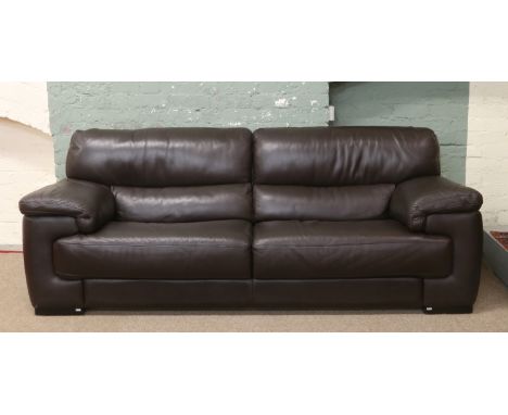 A large good quality brown leather sofa by Violino.