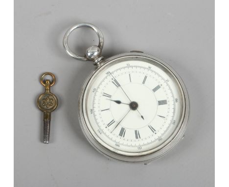 A continental silver pocket watch and key with white enamel dial Roman numeral baton marker and second sweep finger in a good