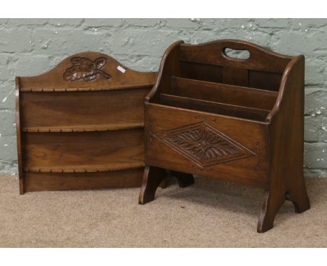 A carved oak magazine rack and spoon display shelf.