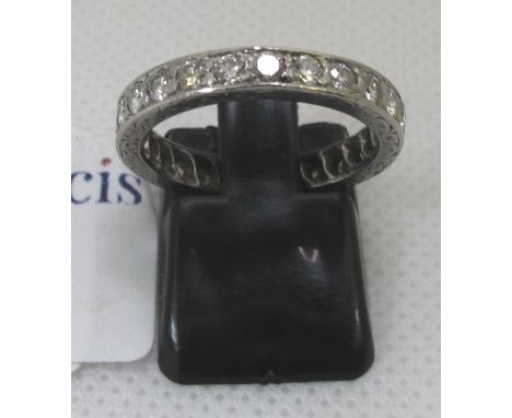 Diamond full hoop eternity ring. 2.9g approx. Ring size L. Unmarked.(B.P. 21% + VAT) 